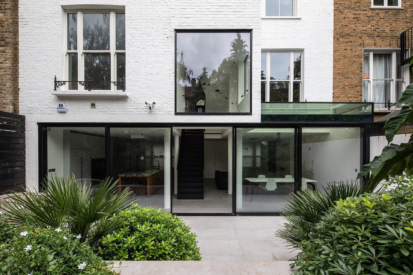 Modern residential rear extension with large glass doors